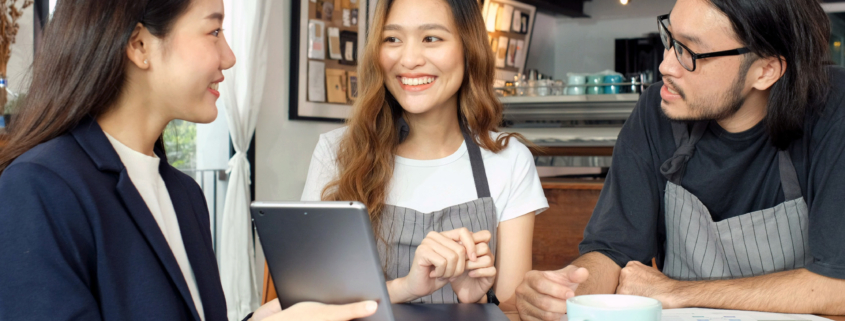 business woman discussing about financial planning with small business owner