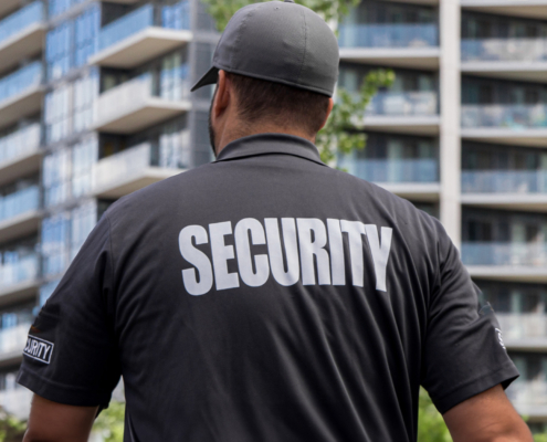 Security guard in uniform patrolling a residential area