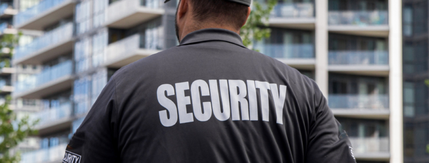 Security guard in uniform patrolling a residential area