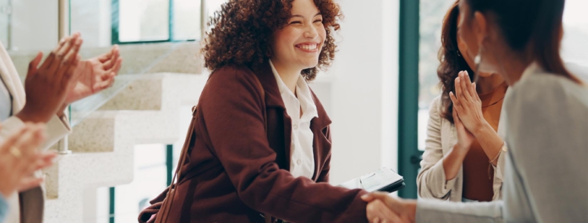 Business person shaking hands with new-hire